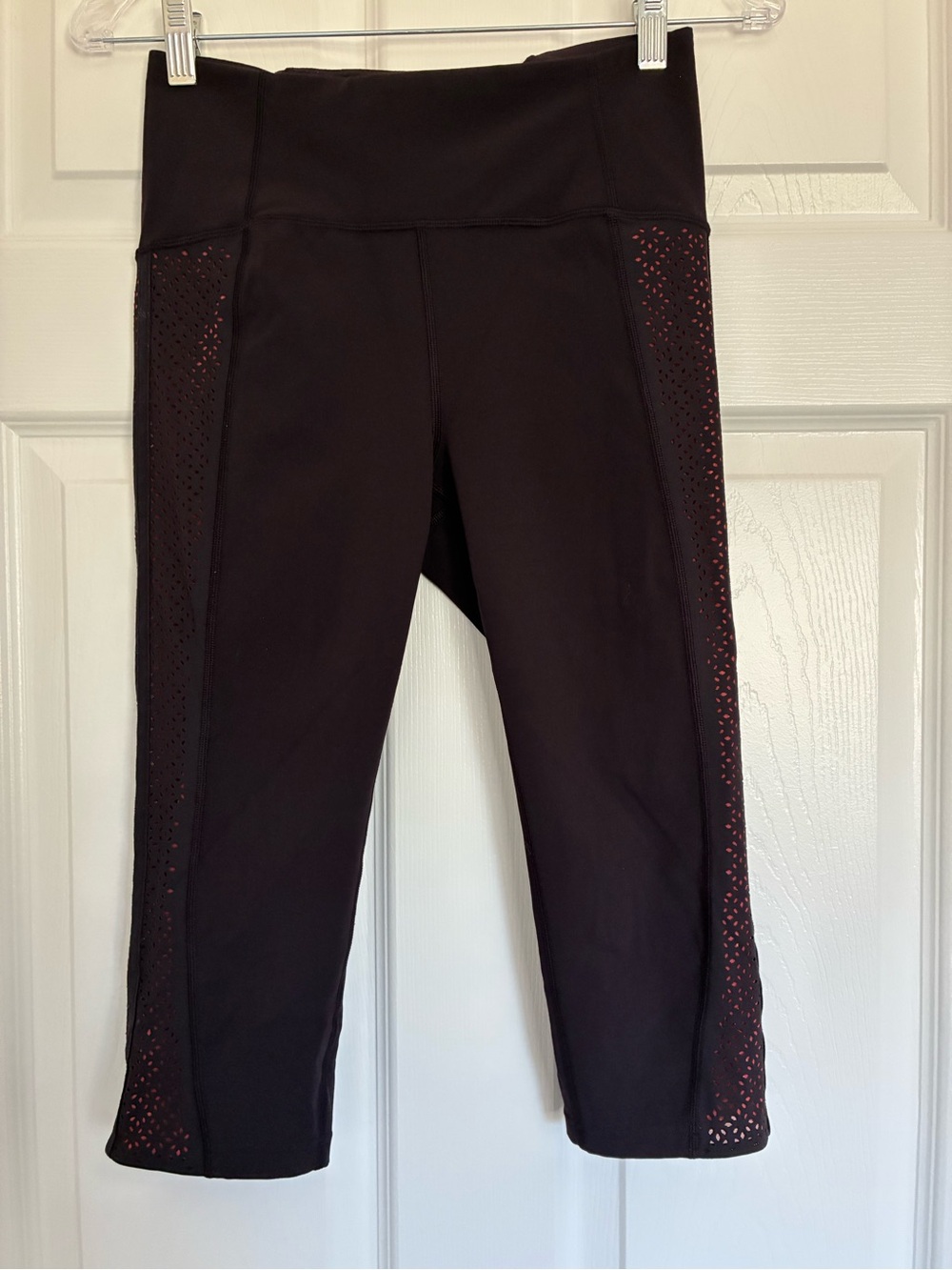 lululemon athletica Black Cropped Leggings with Red Accent Laser Cut Panels - Picture 1 of 4